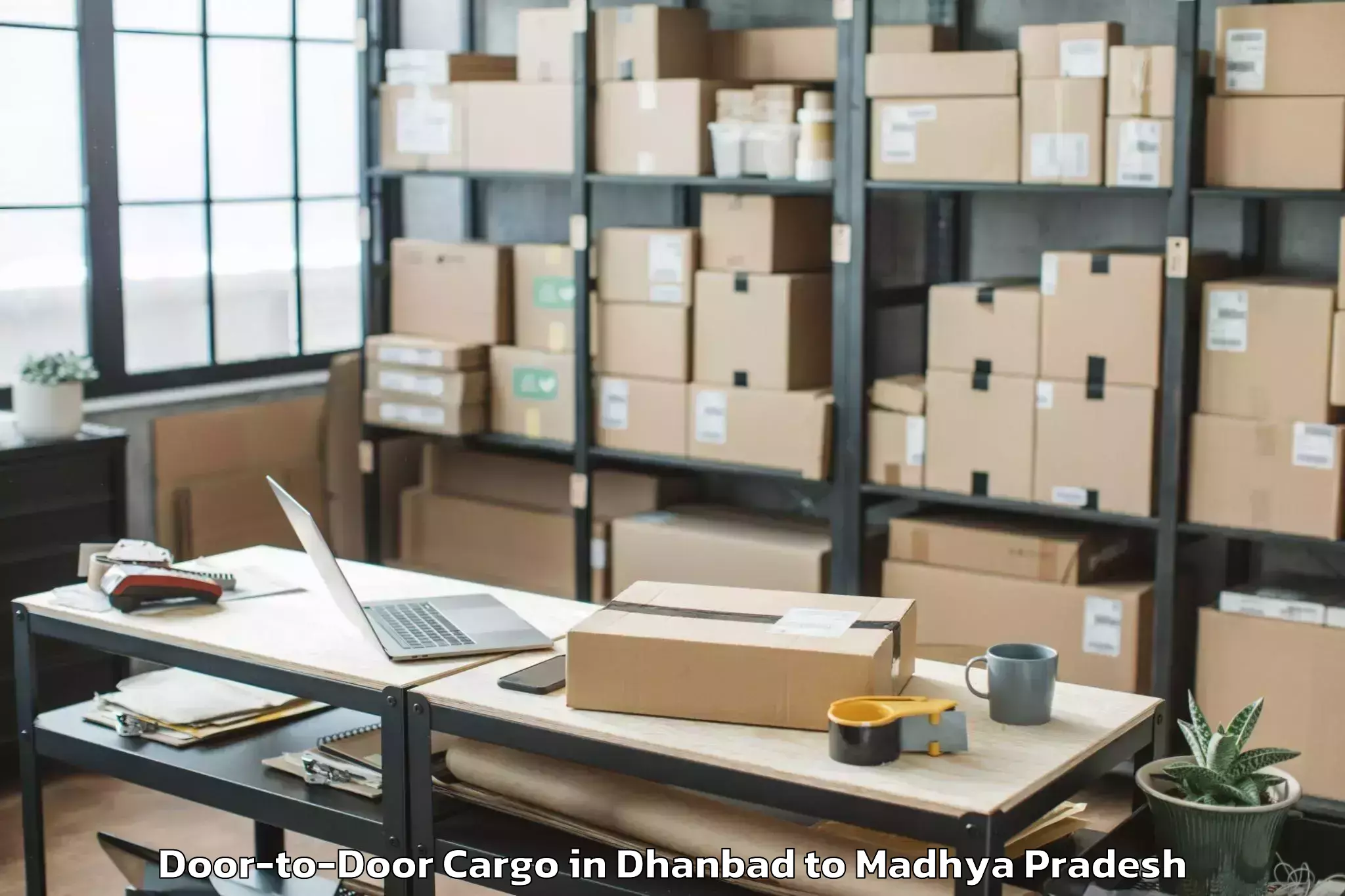 Top Dhanbad to Bhopal Door To Door Cargo Available